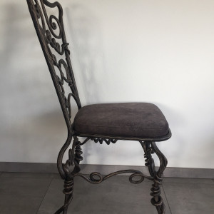 A wrought iron chair Root - luxury furniture
