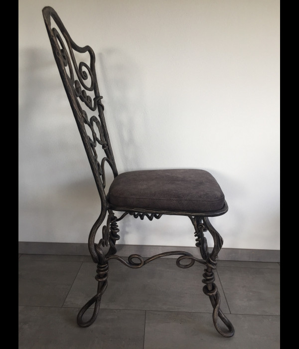 A wrought iron chair Root - luxury furniture