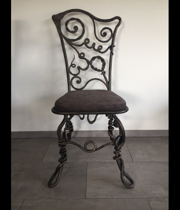 A wrought iron chair Root - luxury furniture