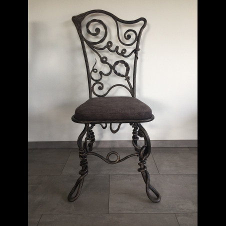 A wrought iron chair Root - luxury furniture