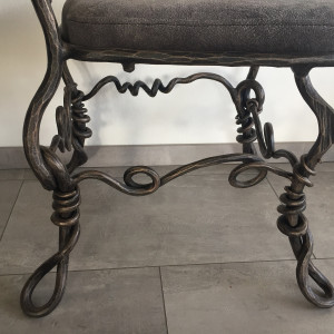 A wrought iron chair Root - luxury furniture