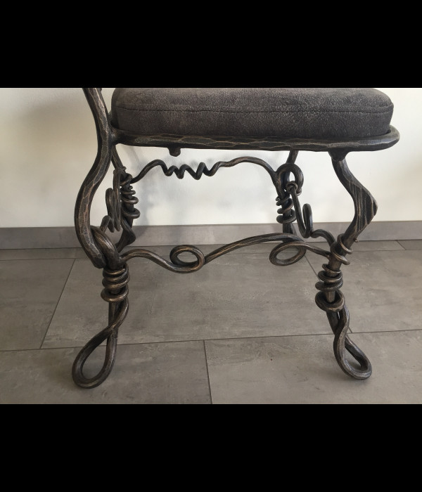 A wrought iron chair Root - luxury furniture