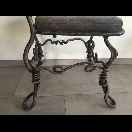 A wrought iron chair Root - luxury furniture