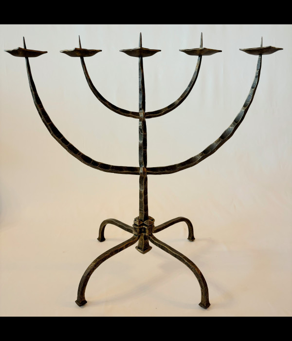 A wrought iron five-armed candelabra