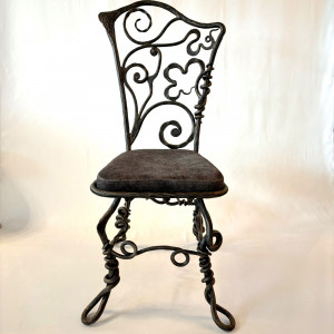 A wrought iron chair Root - luxury furniture