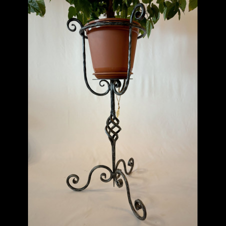 A wrought iron flowerpot