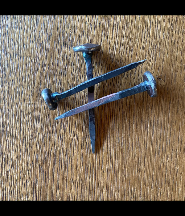 A wrought iron nail