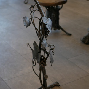 A wrought iron ashtray