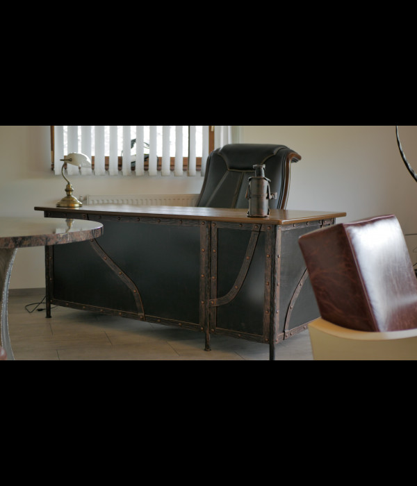 A wrought iron office desk - luxury furniture