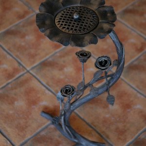 A wrought iron ashtray