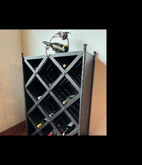 A wrought iron wine cabinet