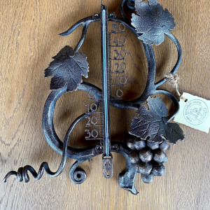 A wrought iron thermometer - garden thermometer