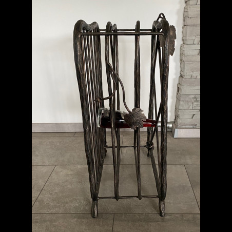 A wrought iron wine cabinet