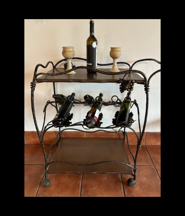 A wrought iron trolley