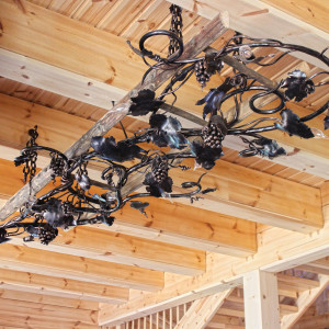 A wrought iron chandelier - ladder - Grapevine