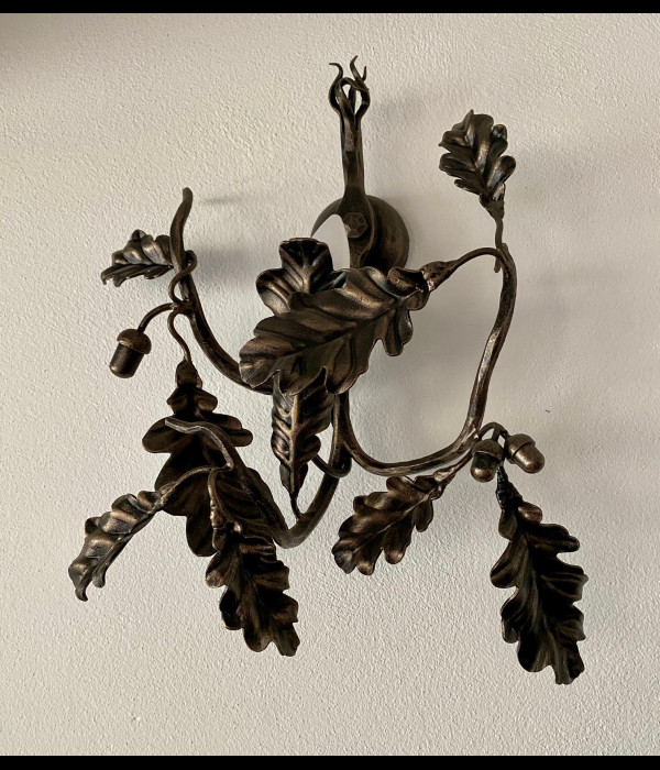 A wrought iron light Oak