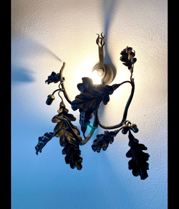 A wrought iron light Oak