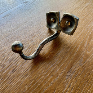 Forged wall hanger - brass patina