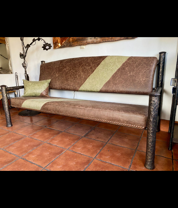 A wrought iron bench - luxury furniture