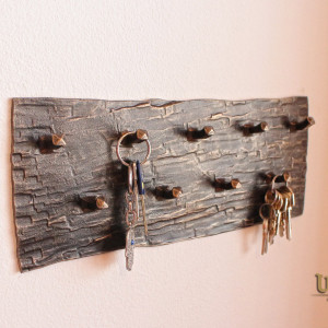 A wrought iron key holder