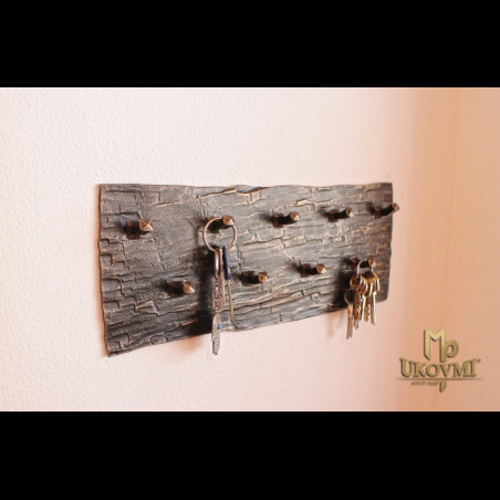 A wrought iron key holder