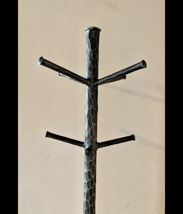 A wrought iron hanger