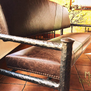 A wrought iron bench - luxury furniture