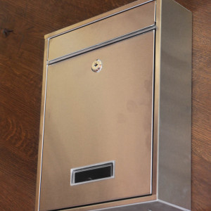 A stainless steel letterbox  (N/30/N)